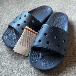 Crocs Classic Slide Sandals in Navy